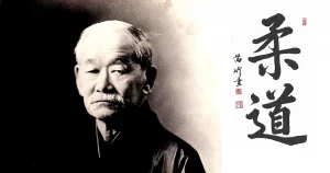 Kano Jigoro mit Schriftzeichen für Judo